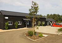 Landscaped surroundings and ample parking at Dedham Vale Business Centre